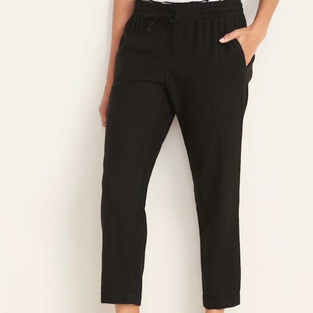 Black cotton loose pants with tie around waist.